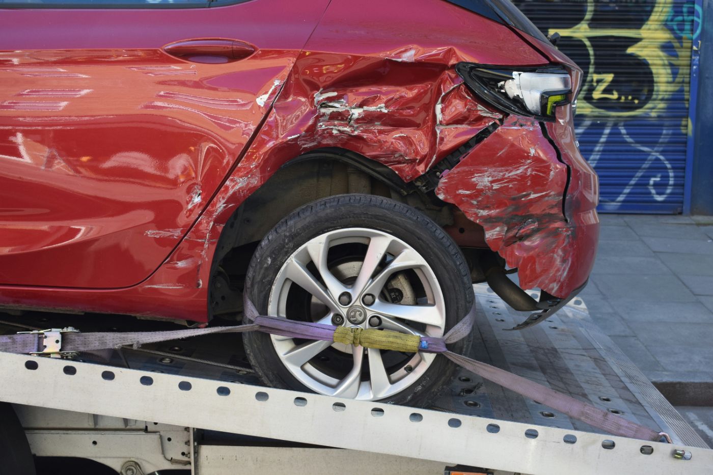 Two cars stopped on a South Carolina road after a rear-end collision in South Carolina, the front bumper of one pressed against the rear of the other