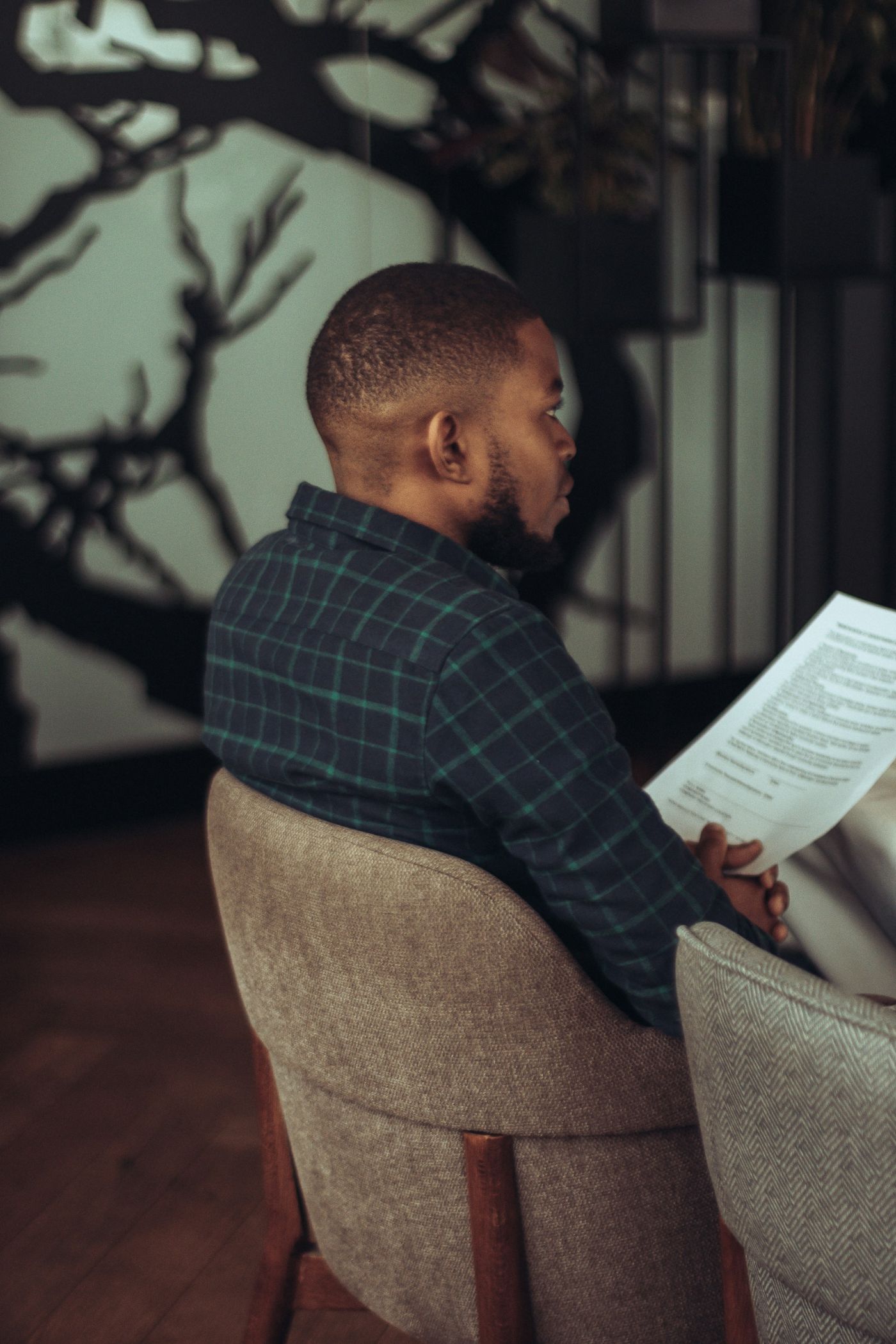 A life insurance policy and a divorce decree on a table, representing beneficiary designations after divorce.
