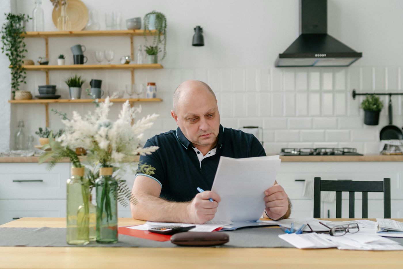 A denied insurance claim letter on a kitchen table, representing a bad faith insurance claim in South Carolina.