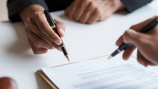 Signing a paper
