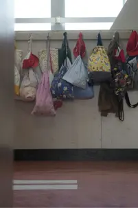 School backpack waiting at front door