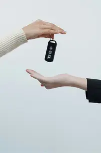 Someone holding car keys
