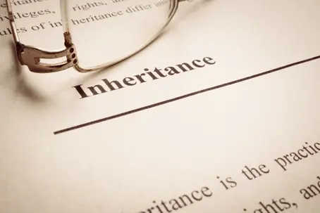 paper that says 'Inheritance' on it