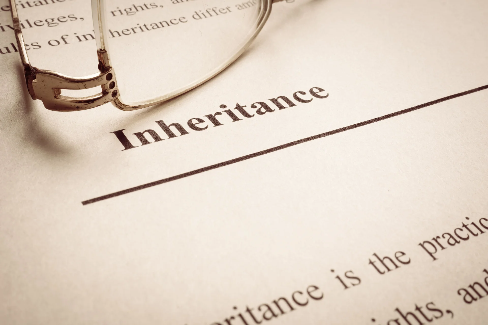paper that says ’Inheritance’ on it